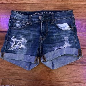 Dark blue ripped jean shorts